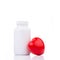 Vitamins or supplements bottle with heart