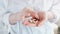 Vitamins And Supplements. Closeup of hand holding variety of white pills on palm. Close-up Of Medication Tablets, Capsules From Ha