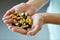 Vitamins And Supplements. Woman Hands Full Of Medication Pills