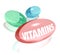 Vitamins on White Background and Word on Capsule