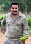 Viticulturist holds Chardonnay grapes in South Australia