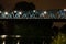 Vittoria bridge in San Dona di Piave illuminated in the evening with reflection on the Piave river