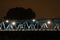 Vittoria bridge in San Dona di Piave illuminated in the evening with reflection on the Piave river