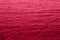 Viva Magenta toned sea water texture. Pool water with sun reflections. Trendy colour 2023 year.