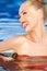 Vivacious laughing woman in water