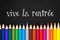 Vive la rentree (meaning Back to school) written on black chalkboard background