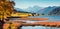 Vivid autumn panorama of Haidersee Lago della Muta lake with Ortler peak on background. Splendid morning view of Italian Alps,