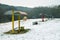 Vivid benches on a winter beach. serenity and emptiness.