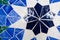 Vivid blue kaleidoscope background. Painted geometric pattern.