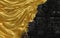 Vivid contrast black and gold in abstract background of metallic gold paint swirling over charred black ashes