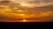 A Vivid Desert Sunset and Clouds