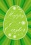 Vivid green easter egg with inscription Happy Easter, decorated with white floral motif, on dark green background with rays