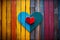 Vivid heart on wooden background