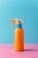 Vivid orange sunscreen bottle on gentle background with ample space for text placement
