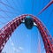 Vivid red suspension bridge