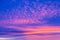 Vivid saturated beautiful sunset sky in pink, purple and blue colors. Sunset background
