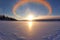 vivid sun dogs reflecting on frozen arctic lake surface