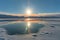 vivid sun dogs reflecting off icy arctic landscape