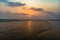 Vivid sunrise on a serene calm tranquil deserted beach at digha