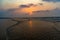 Vivid sunrise on a serene calm tranquil deserted beach at digha puri mandarmaniwith space for text