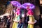Vivid Sydney 2015: women on stilts with electric umbrellas