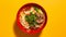 Vivid Szechuan Beef Noodle Soup On Bright Yellow Background