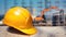 Vivid Yellow Construction Helmet with Copyspace on Blurred Construction Site Background