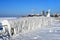 Vladivostok, Amur Bay, quaint ice build-up on promenade over beach Yubileyny