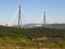 Vladivostok bridge over the green beach of Russky Island