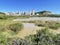 Vladivostok, Patroclus Patrokl bay. Residential neighborhood on Sochinskaya street and nameless lake in autumn in sunny weather