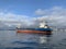 Vladivostok, Russia, 08.06.2019. Dry cargo ship Hong Yang Brize at anchor in the Amur Bay of the Japanese sea in the summer mornin