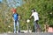 Vladivostok, Russia, August, 31, 2017. Teens learning to jump on the bikes and scooters on the ground on Sportivnaya promenade in