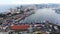 Vladivostok, Russia - August 9, 2021: Top view. Commercial Sea Port. Industrial port with containers.