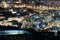 Vladivostok, Russia - Mar 04, 2021: night view of the central part of Vladivostok from a height. Spaso-Preobrazhensky