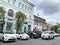 Vladivostok, Russia, October, 26, 2019. Cars parked near house number 7- tea house and warehouse of manufactory Zhuklevich. Built