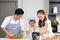 Vlogger family enjoy cooking together and recording videos about homemade cooking