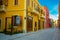 VLORA-VLORE, ALBANIA: Historical multi-colored buildings on the street in the city center.