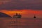 Vlore, Albania - 5 September 2022: Big passenger ferry ship Galaxy on sunset background in Vlore city port. Wonderful sunset on