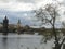 The Vltava River and the medieval Charles Bridge with towers and statues, Prague, Czech Republic.