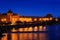 Vltava river in night, Prague in Czech Republic. Twilight view of Prague with rose-orange sky, Smetanovo nabrezi, Prague,