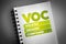 VOC - Volatile Organic Compound acronym on notepad, concept background