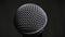 The Vocal Microphone Slowly Rotates on a Black Background Close-Up