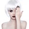 Vogue Style Woman. Fashion Beauty Woman Portrait with White Short Hair. Hairstyle. Manicured polish nails.