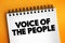 Voice of the people - means the opinion of the majority of the people, text concept on notepad