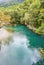 Voidomatis river in aristi village trees rafting boats in autumn season