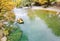 Voidomatis river in aristi village trees rafting boats in autumn season