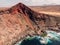 Volcanic crater with Atlantic ocean near La Santa, Lanzarote. Aerial view