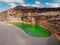 Volcanic crater with a green lake near El Golfo, Lanzarote. Aerial view