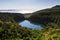 Volcanic crater with lake Lagoa Seca on Pico island short after sunrise