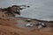 Volcanic landscape, beach and boats next to Green Lake in El Golfo, Lanzarote